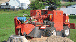 Stump grinder’s sweep reduces repositioning