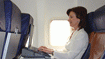 Ergonomic stand supports laptops on airplanes